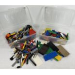 2 small plastic tubs of assorted Lego pieces to include base plates.