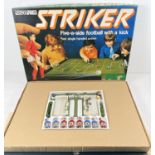 A boxed 1970's Parker Games Striker football game. Complete and with instructions and playing