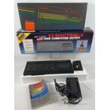 A boxed Sinclair ZX Spectrum +2, complete with power pack, 16k Cheetah interface and instruction
