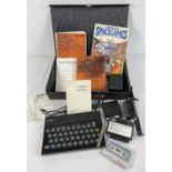A vintage Sinclair ZX Spectrum personal computer and accessories. Complete with: ZX power supply,