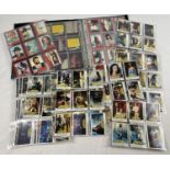 An album containing a quantity of 1970's Superman The Movie and Battlestar Galactica trading cards.
