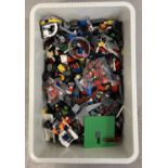 A tub containing 5kg of assorted Lego pieces to include some small sealed bags.