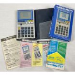 A vintage boxed Casio MG-777 game calculator. Complete with wallet style case, leaflets and