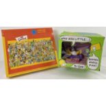 A sealed "The Simpsons" double sided jig-saw puzzle together with a boxed novelty Simpsons talking