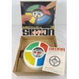 A vintage 1978 Japanese version "Simon" electronic game, complete with original box and