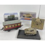 A collection of collectors and vintage toys. To include a tinplate O gauge Hornby carriage, boxed