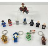 A collection of 12 Lego mini figures and mini figure keyrings. To include Batman, Wonder Women,