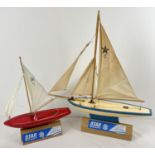 2 vintage Star Productions Pond yachts. Red and white SY2 together with a blue and white SY4.