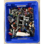 A tub containing 4.5kg of assorted Lego pieces.