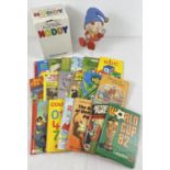 A boxed ceramic Noddy money box together with a collection of 18 assorted Ladybird books.