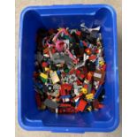 A tub containing 5kg of assorted Lego pieces.