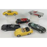 6 diecast 1/18 scale model vehicles by Maisto and Burago. To include: Mustang GT, Porsche Carrera,