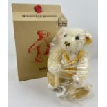 A 12" Margarette Steiff fully jointed, blond haired Millennium teddy bear. With Millennium medal