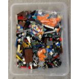 A tub containing 5kg of assorted Lego pieces to include some small sealed bags.