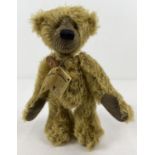 A 10.5" Limited Edition, fully jointed, mohair Grisly German teddy bear, named Buttons. With