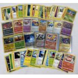A collection of 100 assorted Pokemon trading cards to include holo's & reverse holo's.