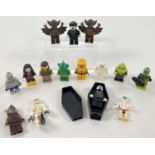 A collection of 15 Lego mini figures to include Dracula in a coffin, Skeletons, Vampires and other