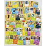 200 assorted modern pokemon trading cards.