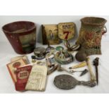 A collection of mixed vintage items. To include waste baskets, metal fruit price sign, ordnance