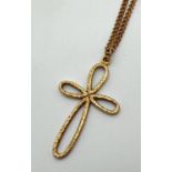 A large 9ct gold looped cross pendant and chain. A 4cm drop pendant, fully hallmarked and with