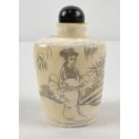 A small oriental style scent bottle in cream and black depicting an oriental lady in a garden scene.