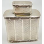 A Mappin & Webb Edwardian silver tea caddy with panelled engine turned decoration. Hallmarked to