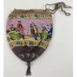 A 1920's bead and crochet drawstring evening bag. Classic figural scene throughout made entirely