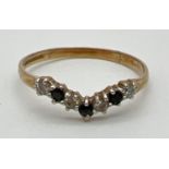 A 9ct gold, sapphire & cubic zirconia wishbone half eternity ring. Fully hallmarked inside band
