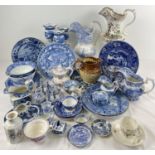 A large collection of antique and vintage blue and white ceramics in varying conditions. To