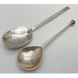 2 early 20th century silver spoons. An Arts & Crafts spoon by George Edward Hunt, with hammered