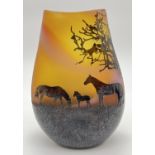An Ed Burke, E & M studio glass Country Scene vase in orange colours featuring horses. Approx. 16.