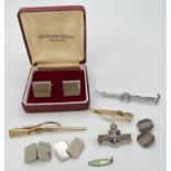 A small collection of costume jewellery items to include tie clips, cufflinks & silver pin brooch.