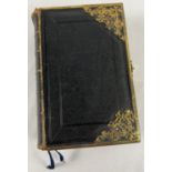 A vintage leather bound book of Common Prayer with decorative brass corners and catch. Printed by