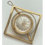 A vintage ball watch pendant by Corocraft, set with carnelian stone to back of watch. Geometric