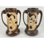 A pair of Bretby Art Nouveau twin handled vases #1681 from the 'Carved Bamboo' range. Approx. 26cm