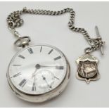 A Victorian fusee silver pocket watch, hallmarked London 1886. Complete with white metal Albert