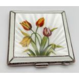 A vintage silver square shaped compact, white guilloche enamelled lid with hand painted tulip