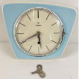 A 1956 Junghans Bauhaus teal ceramic wall clock with eight day plus power reserve. Designed by Max