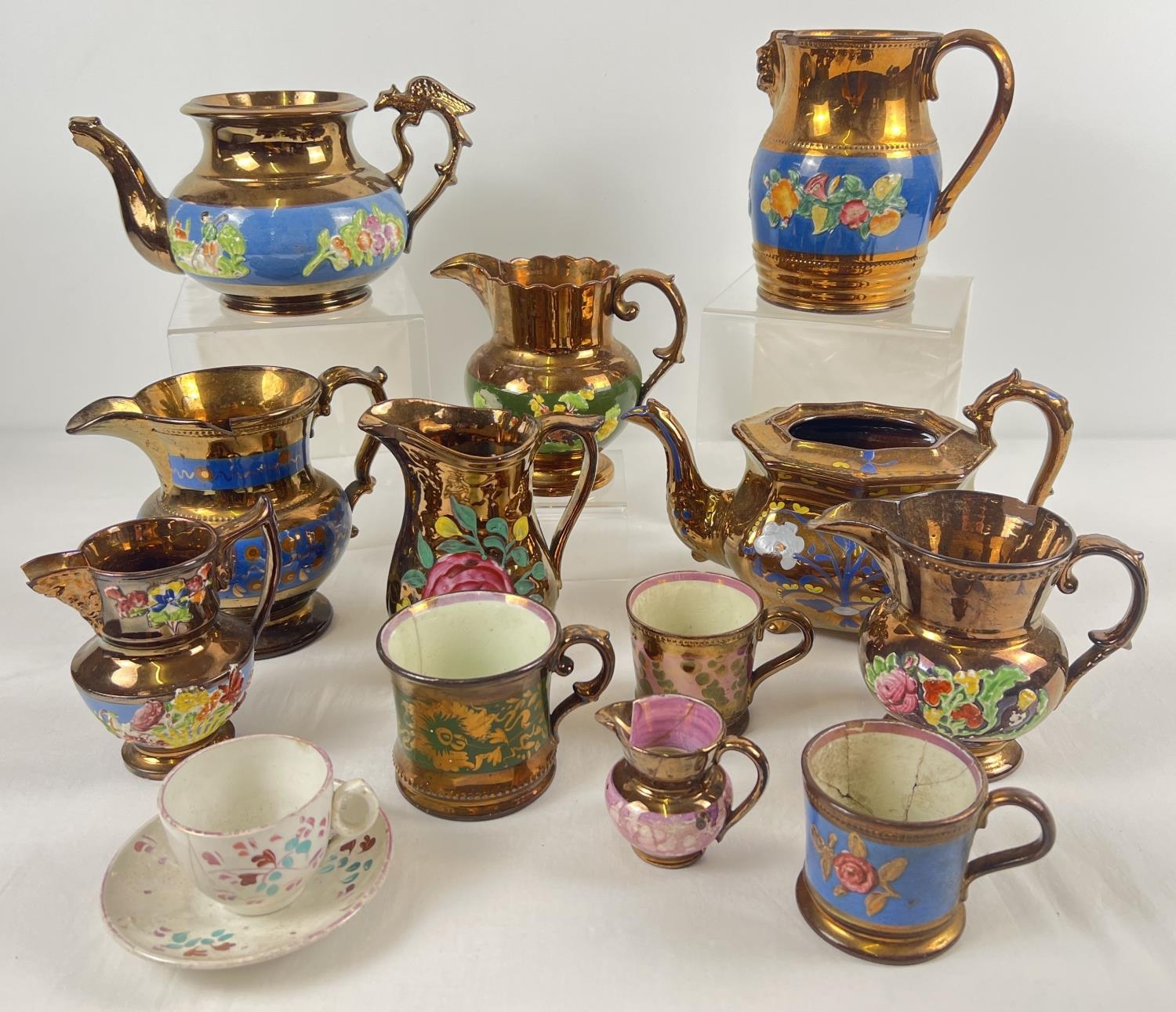 A collection of antique lustre ware ceramics in varying styles and conditions. To include jugs,