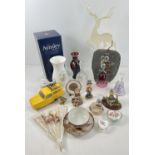 A box of assorted misc items to include ceramics and glass. Lot includes: Goebel Hummel figures,