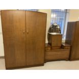 A 4 piece 1960's oak veneered bedroom suite by Austinsuite, Austin Leyton Ltd. London. Comprising: