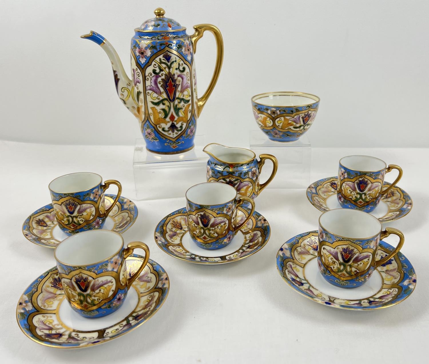 A vintage Noritake Japanese ceramic coffee set with floral & gilt decoration. Comprising: coffee