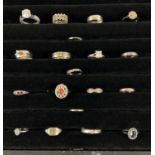 A large 8 row ring display cabinet with 18 assorted silver & white metal rings. Cabinet perspex is