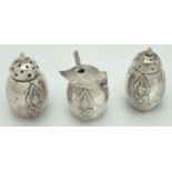 A vintage sterling silver cruet set with oriental deity decoration front and back. Comprising: