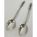 A pair of Victorian silver twist handled apostle tea spoons. Fully hallmarked to reverse of bowl for