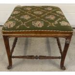 An antique birds eye maple square shaped stool with tapestry and velvet upholstered seat.