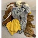 A box of assorted theatre costume animal suits.