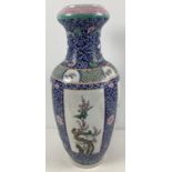 A finely painted large blue ground Chinese floor vase. With 4 panelled design featuring Chinese