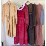 4 vintage theatre company costumes, 3 dresses and a 2 piece suit. In varying styles and colours.