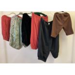 6 assorted pairs of theatre company pantaloons and short trousers. In varying sizes and colours.